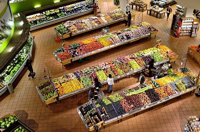 overhead view of supermarket aisles and produce 
