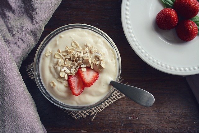 Cup of yogurt with oats and berries
