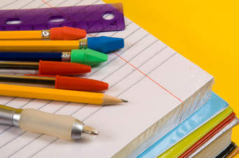 school supplies: paper, pencils, pens, ruler