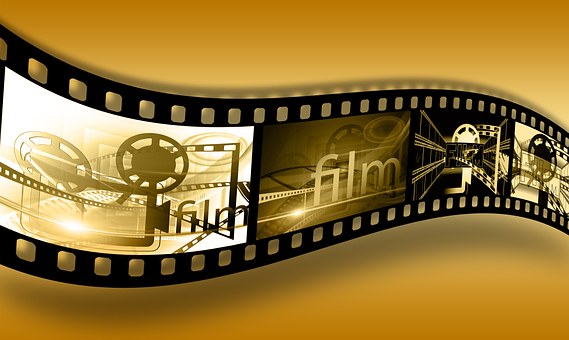 Film strip with movie images on gold background.