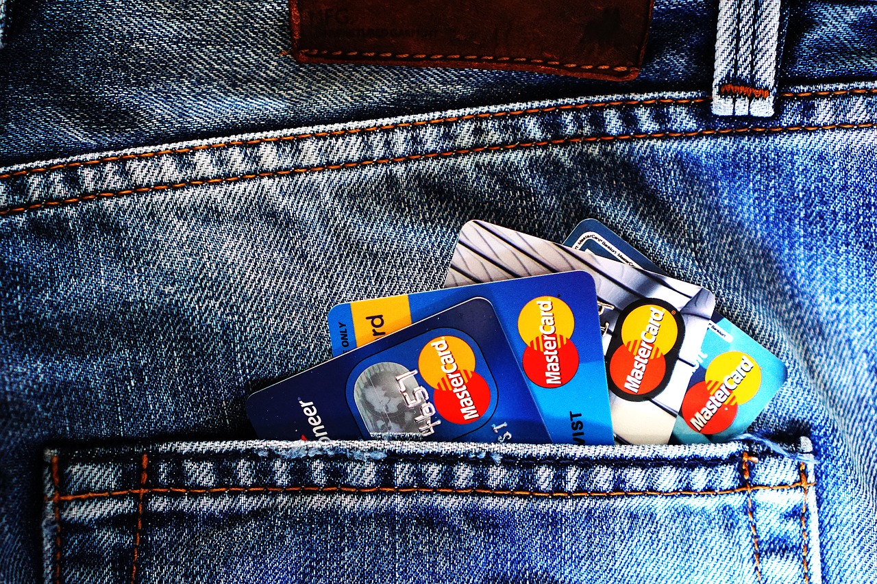 fan of credit cards in a jeans pocket