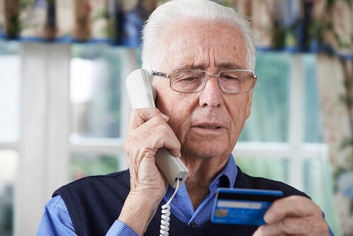 image of an older man on the phone