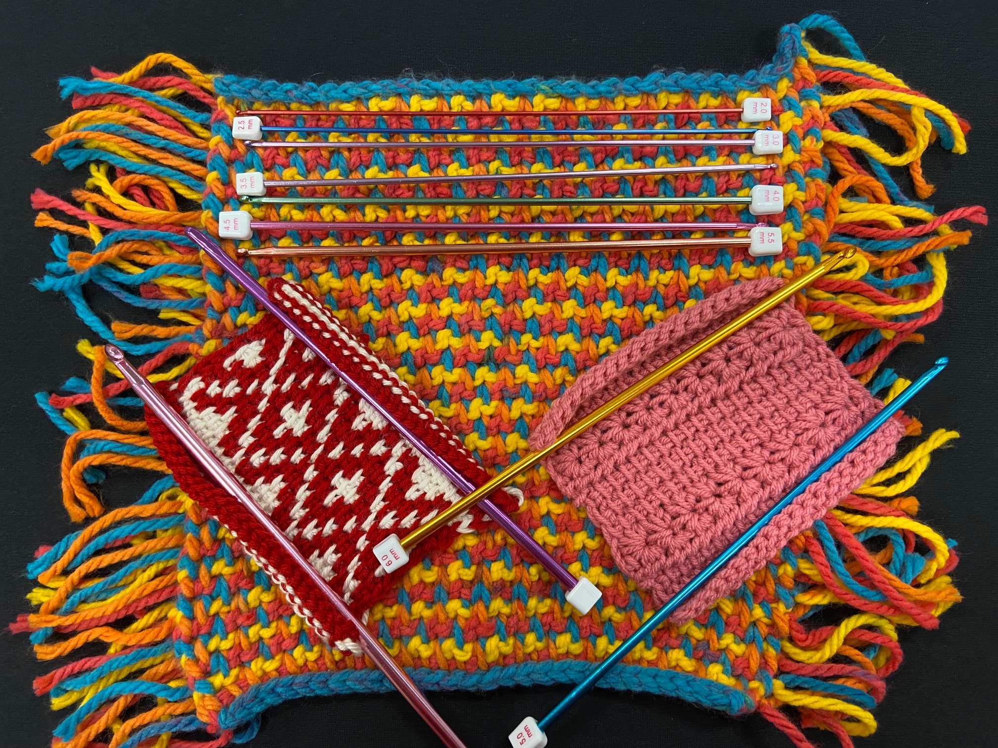 Three Tunisian Crochet projects, and crochet needles