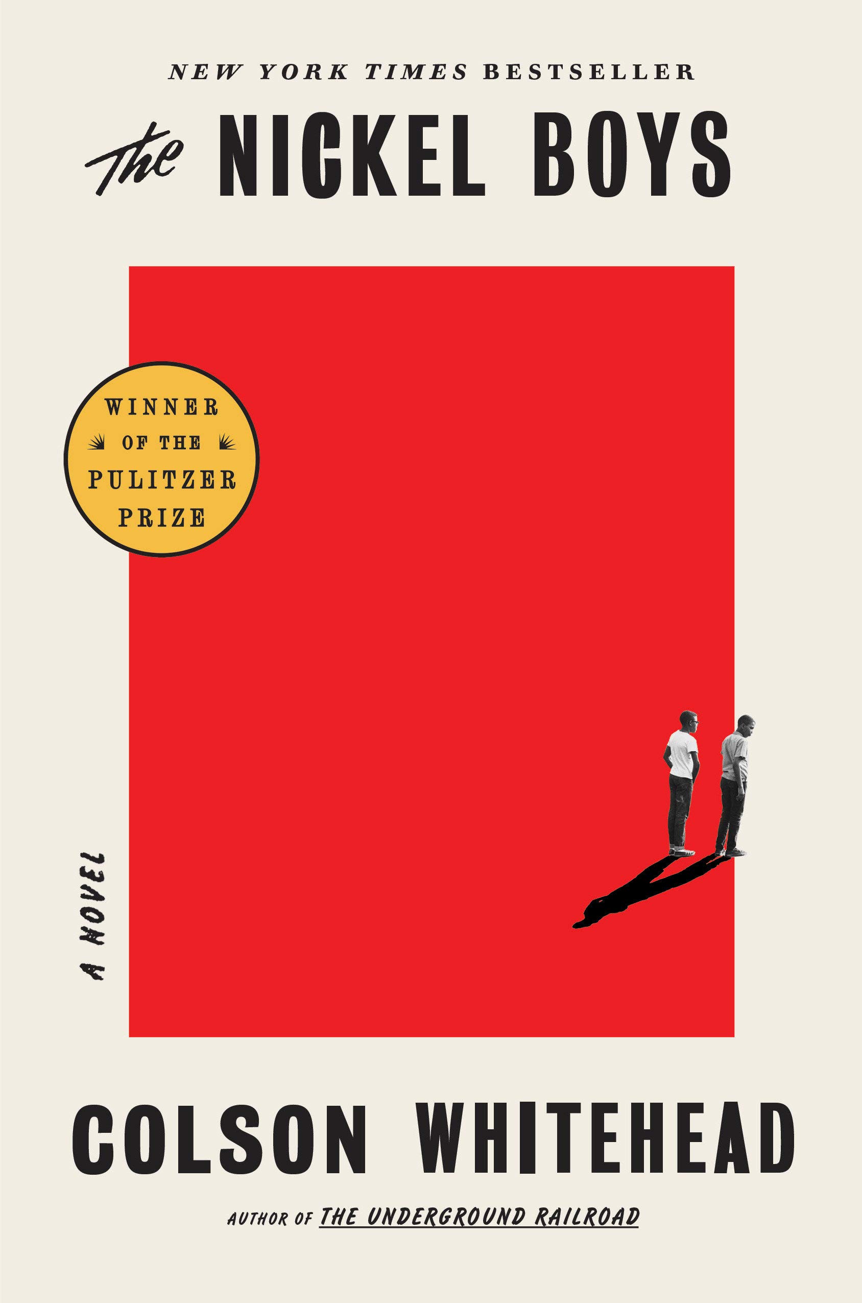 white cover with a large red rectangle and a tiny image of two boys at the edge of the red