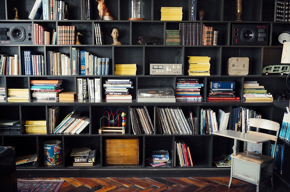 grid of crowded bookshelves