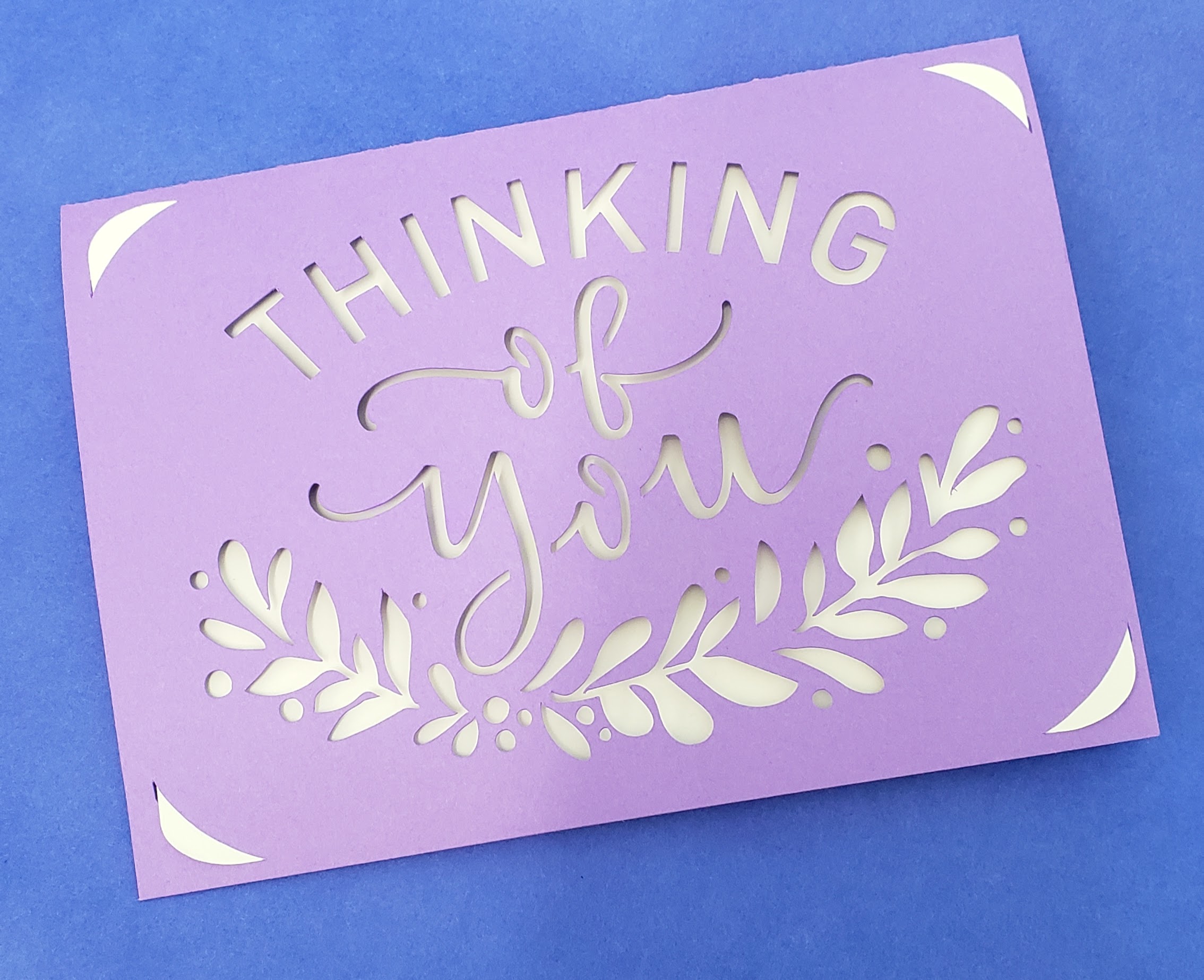 Purple card with text "Thinking of You"
