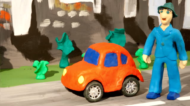 man and red car claymation