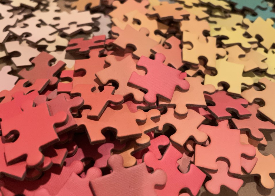 A pile of colorful puzzle pieces