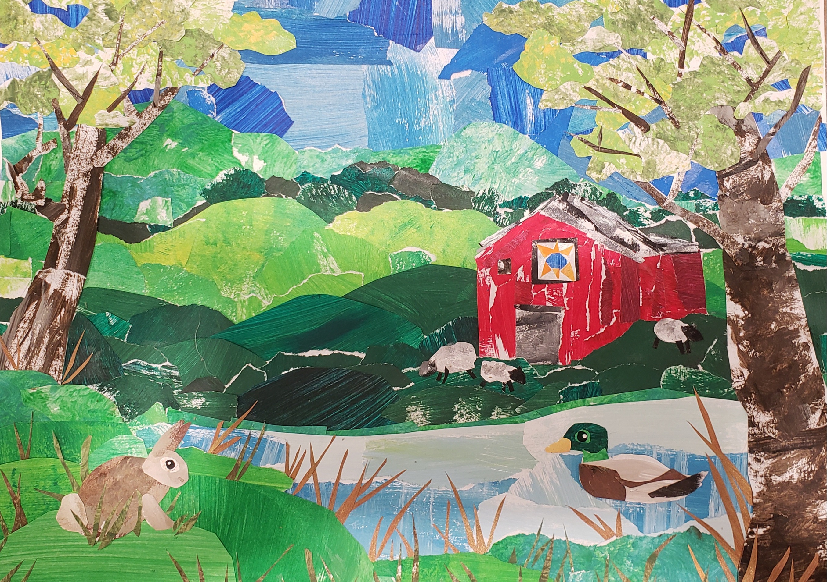 a painted paper collage of a country scene