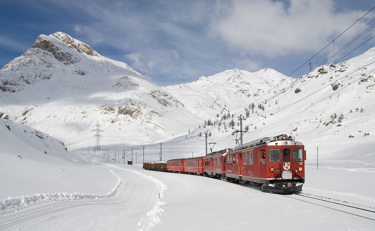 Train traveling in snow