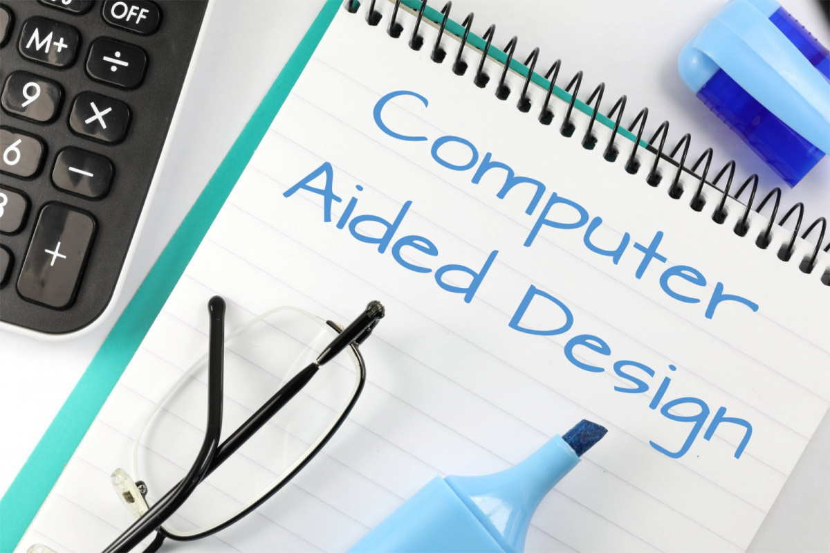 Computer Aided Design written on notepad near glasses & highlighter - Creative Commons Pix4Free