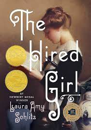 Book Cover The Hired Girl Showing a women in blue dress reading with brown background