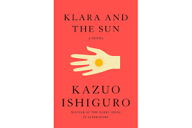 A photo of the book cover which features a hand with a sun inside of it.