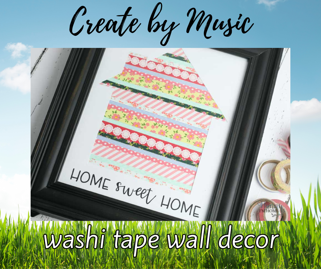Create by Music at the top with Washi Tape Wall Decor at the bottom set against a background of blue sky and grassy field. Center picture is of the project which is a framed example of the craft.
