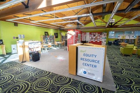 The Equity Resource Center special collection, with the 'Undesign the Red Line' exhibit and seating.