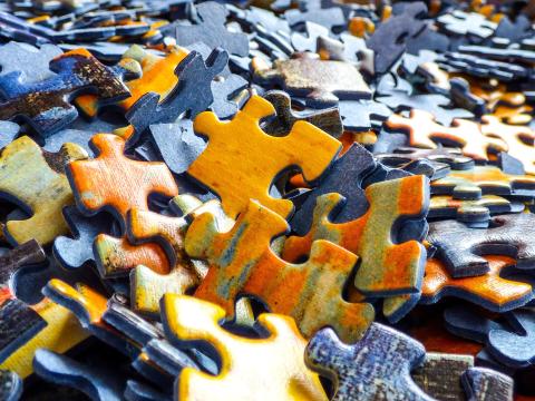 a pile of puzzle pieces