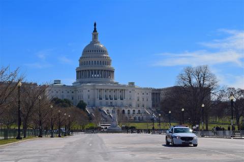 The U.S. Capitol building on a day with a clear blue sky.