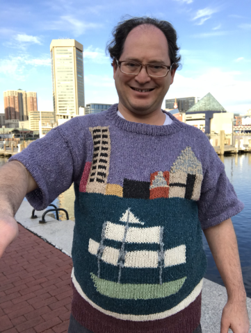 Selfie of Sam Barsky, at Baltimore's Inner Harbor, wearing his "Inner Harbor" sweater