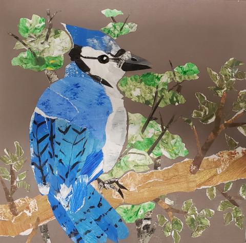 a painted paper collage of a blue jay on a branch 