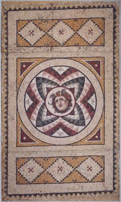 a brown and maroon geomaetric mosaic design