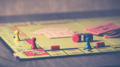 small colorful game pieces on a board