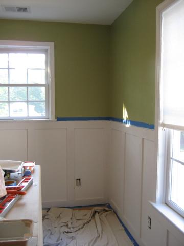 green and wile wall with wainscotting