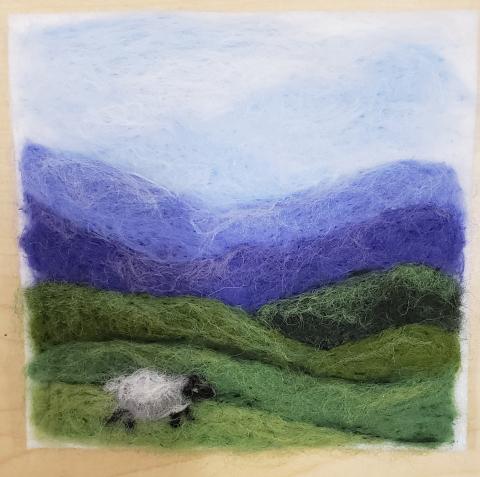 a landscape made using needle felting