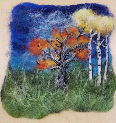 a landscape made using wet wool felting