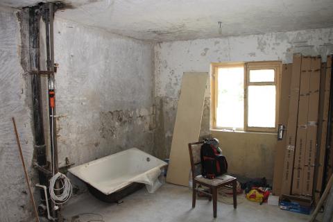 a bathroom gutted ready for a remodel