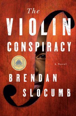 book cover for "the violin conspiracy" by brendan slocumb featuring a closeup of a violin sound hole