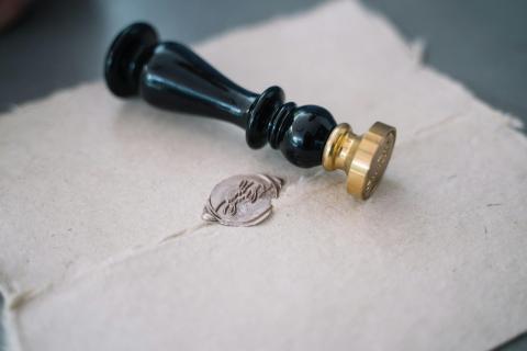 wax seal stamp and wax seal made by it sealing a letter