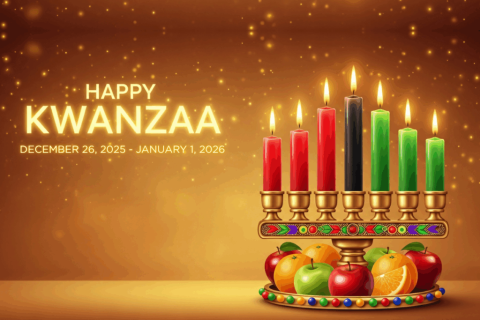 Gold background with gold lettering saying Happy Kwanzaa with dates 12/26-Jan 1, Lit candles three red, 1 black, three green and below the candles are some fruit (apples and oranges)