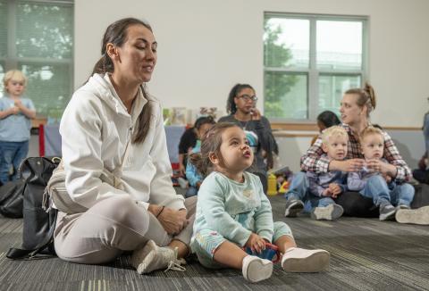 Mother and child watching a storytime