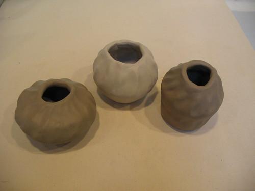 three simple clay pinch pots