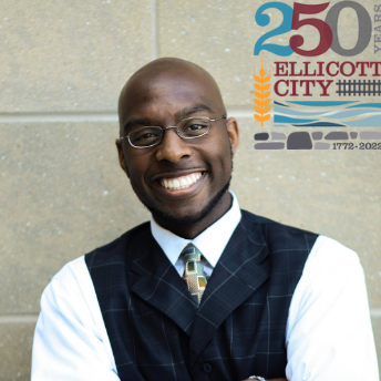 Photo of presenter, Marcus Nicks, with Ellicott City 250 celebration logo.