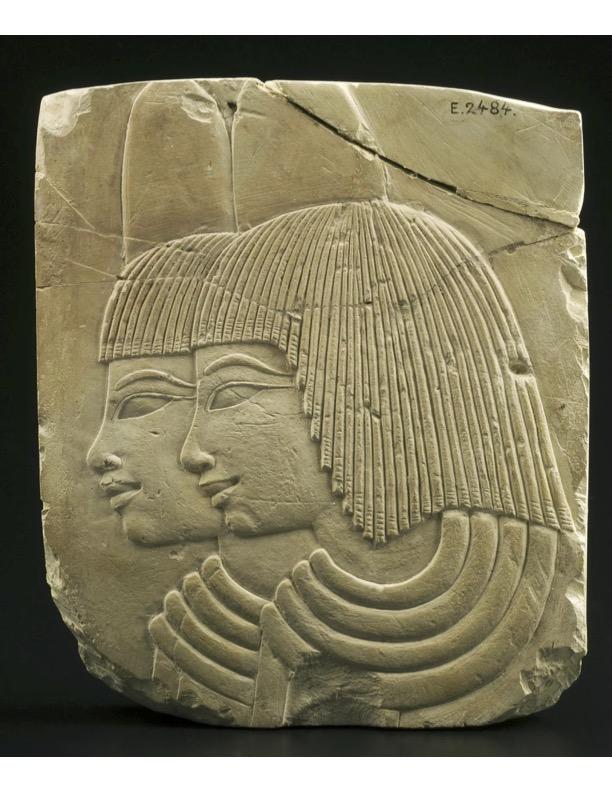 Low relief of two dignitaries bowing for the King