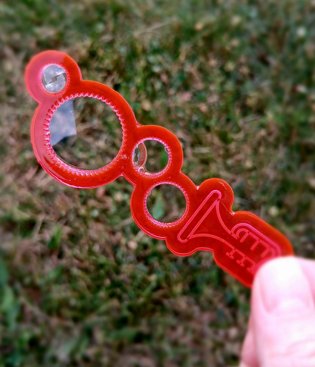 Trumpet bubble wand cut from pink acrylic