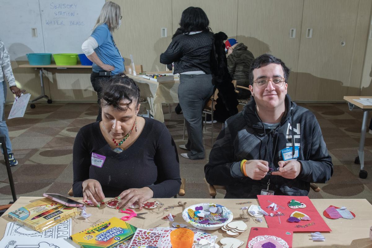 2 adults doing a craft - HCLS Flickr