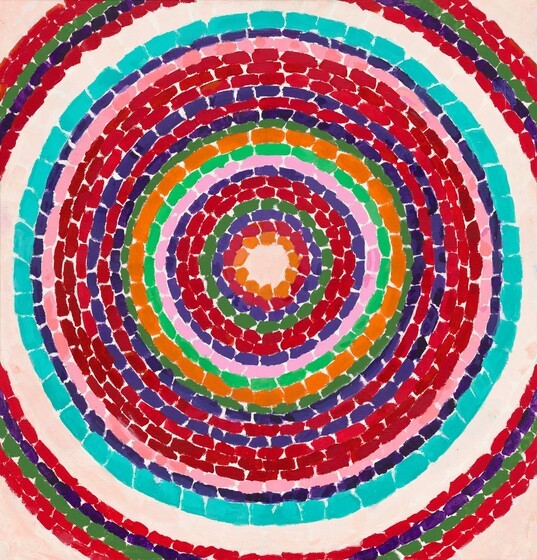 concentric circles in mosaic with red, white, turquioise and blue