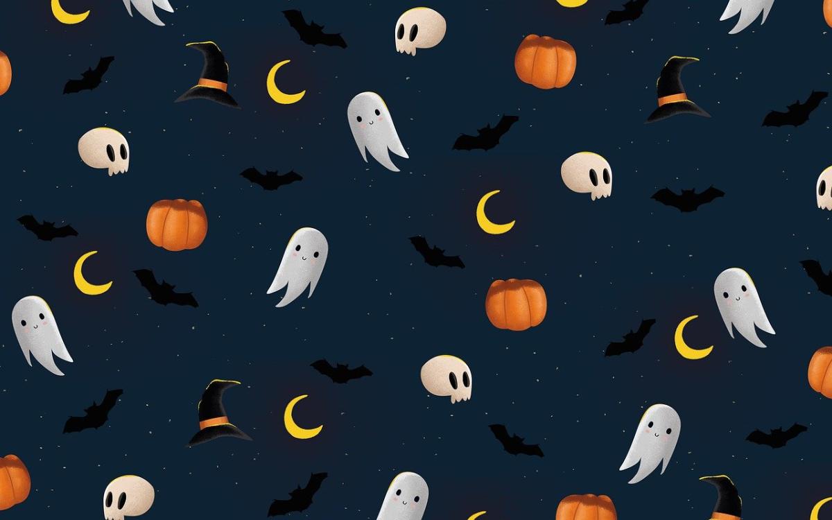 ghosts and pumpkins on dark background