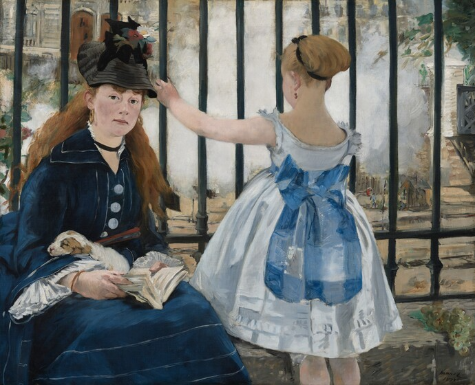 a women sitting wearing a blue dress with a little girl facing away and holding a black fence