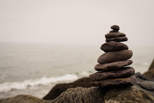 stacked stones at the ocean 