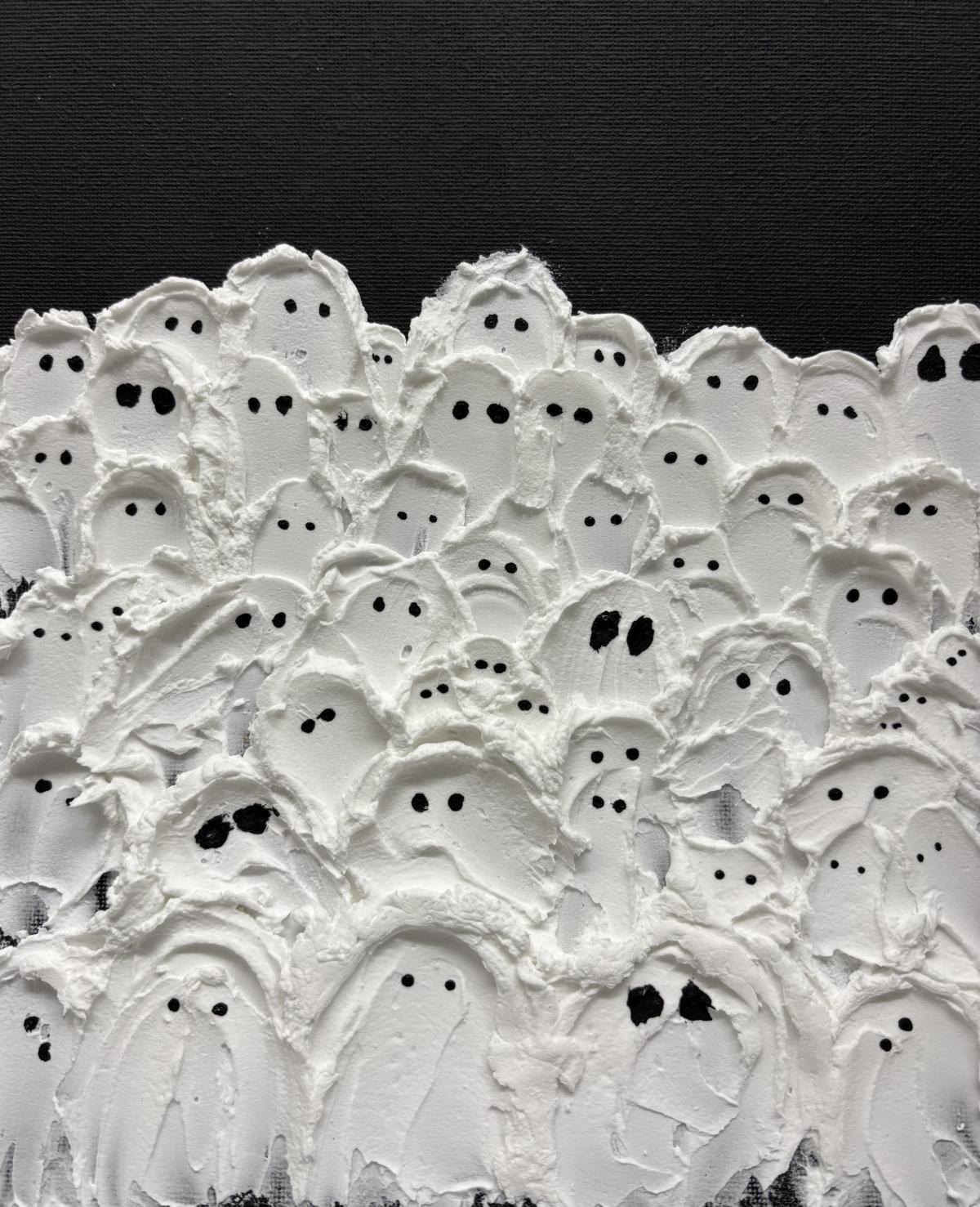 Spackled ghost art on black painted canvas